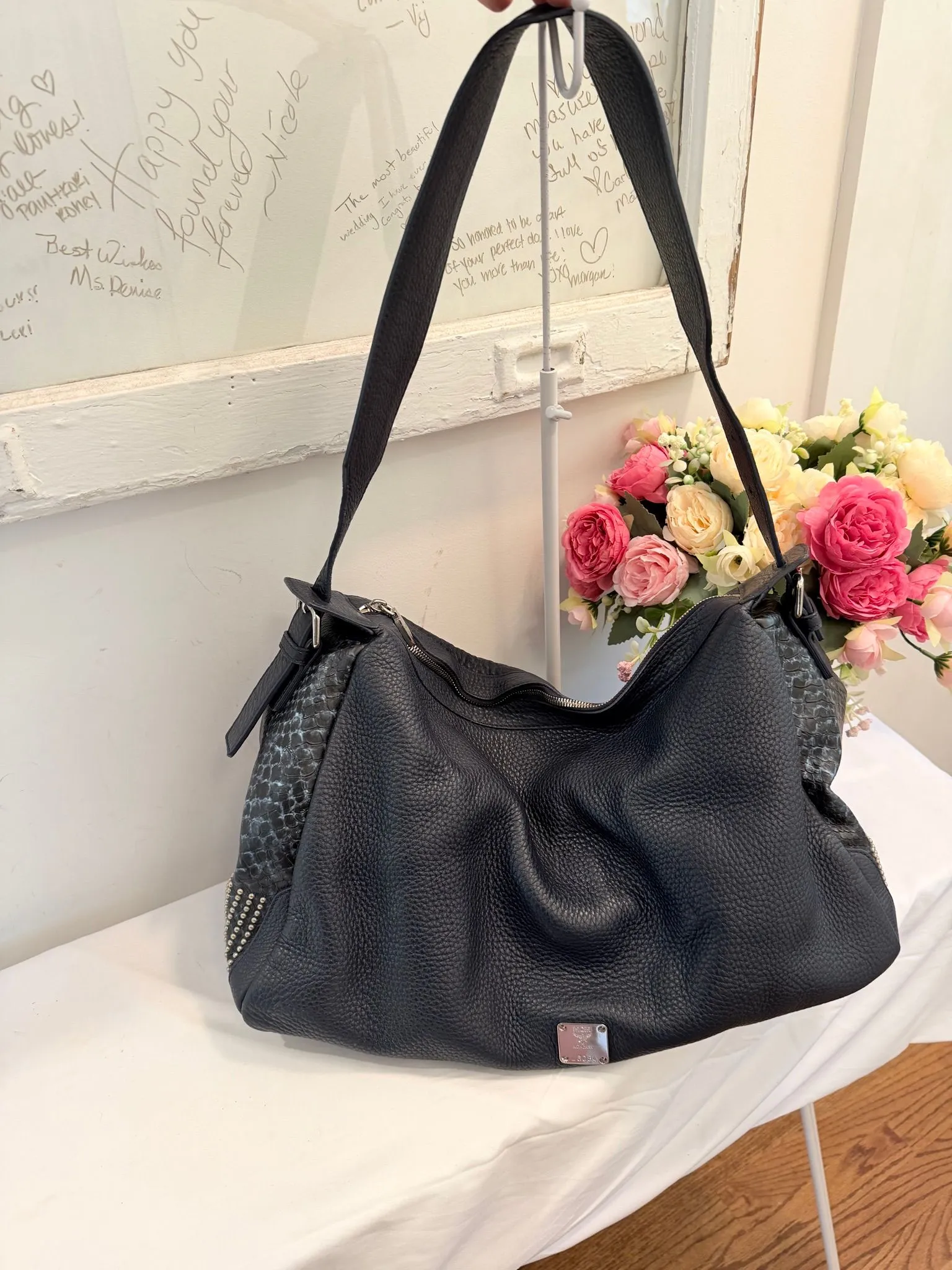 Authenticated MCM Large Navy and Silver Studded Hobo Bag — pre-owned luxury designer bag | LaceLuxx