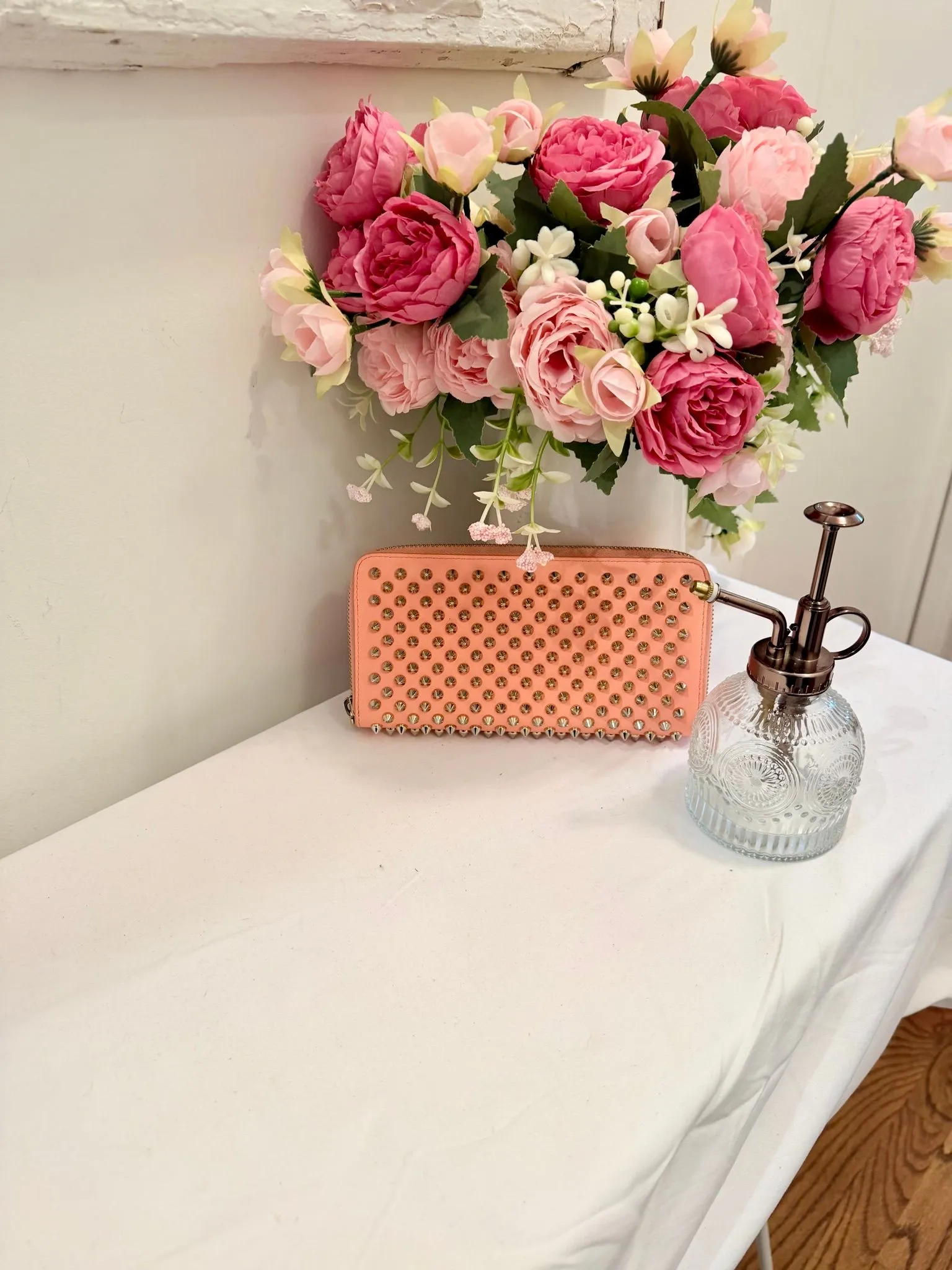 Authenticated Christian Louboutin Coral Wallet with Studding — pre-owned luxury designer bag | LaceLuxx